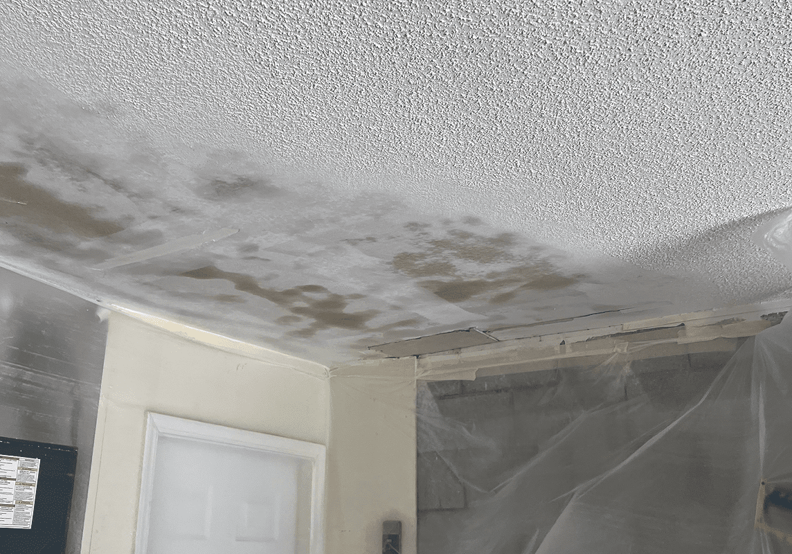 Ceiling with water damage and stains